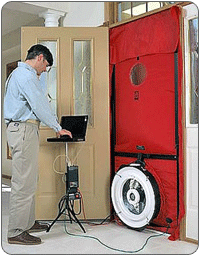 A man conducting a blower door test on a residential home